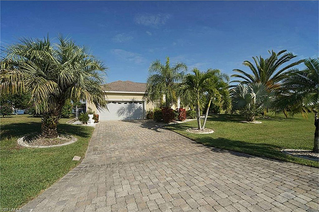 Custom built pool home offered Turnkey on Lake Valmora next to Jim Jeffers Park