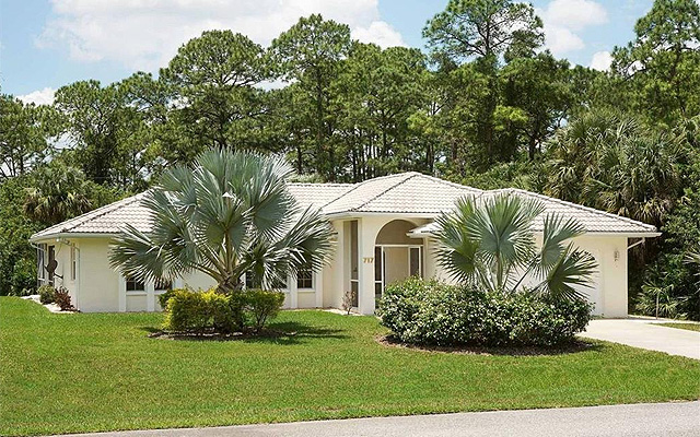 Turnkey - nicely furnished custom built pool home